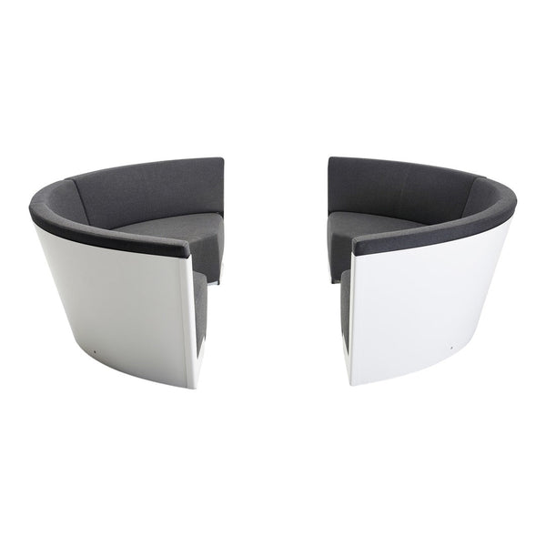 Modern black and gray upholstered chairs with sleek white backs, featuring a minimalist and contemporary design.