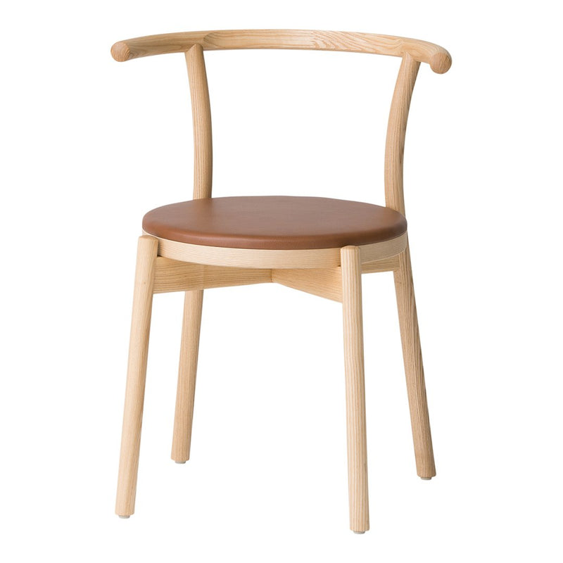 Natural wood chair with light beige finish and brown leather seat, featuring a minimalist design and curved arms.