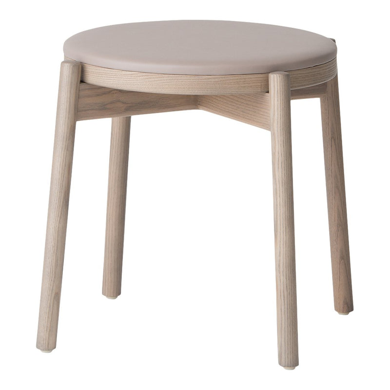 Round beige stool with light wood legs and a smooth, minimalist design. Ideal for modern home decor.
