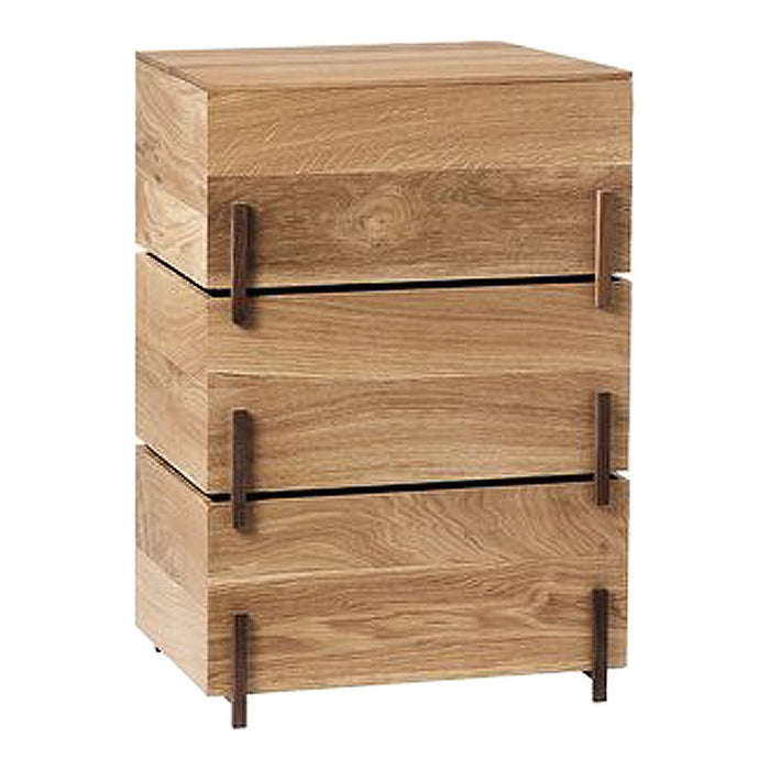 Natural wood bedside table with a light oak finish and sleek black accents, featuring three smooth drawers.
