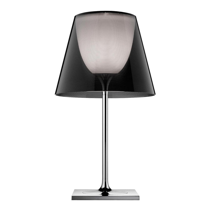 Black and gray lamp with a sleek chrome base and a modern shade design, perfect for stylish interiors.