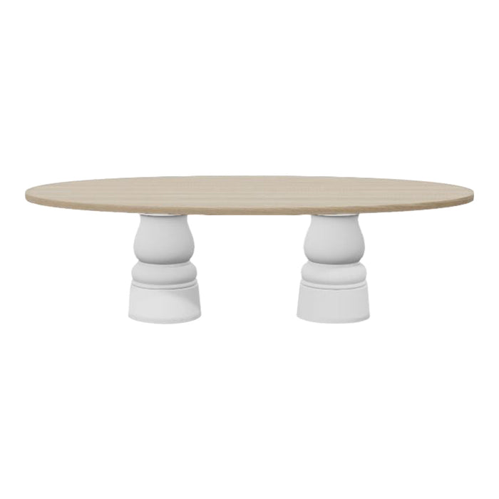 Oval wooden table with a natural beige top and textured white pedestals, featuring a modern and minimalist design.