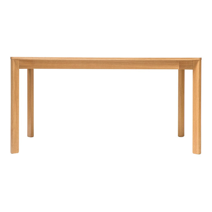 Natural oak dining table with a smooth, minimalist design and warm wood tones. Perfect for modern decor.