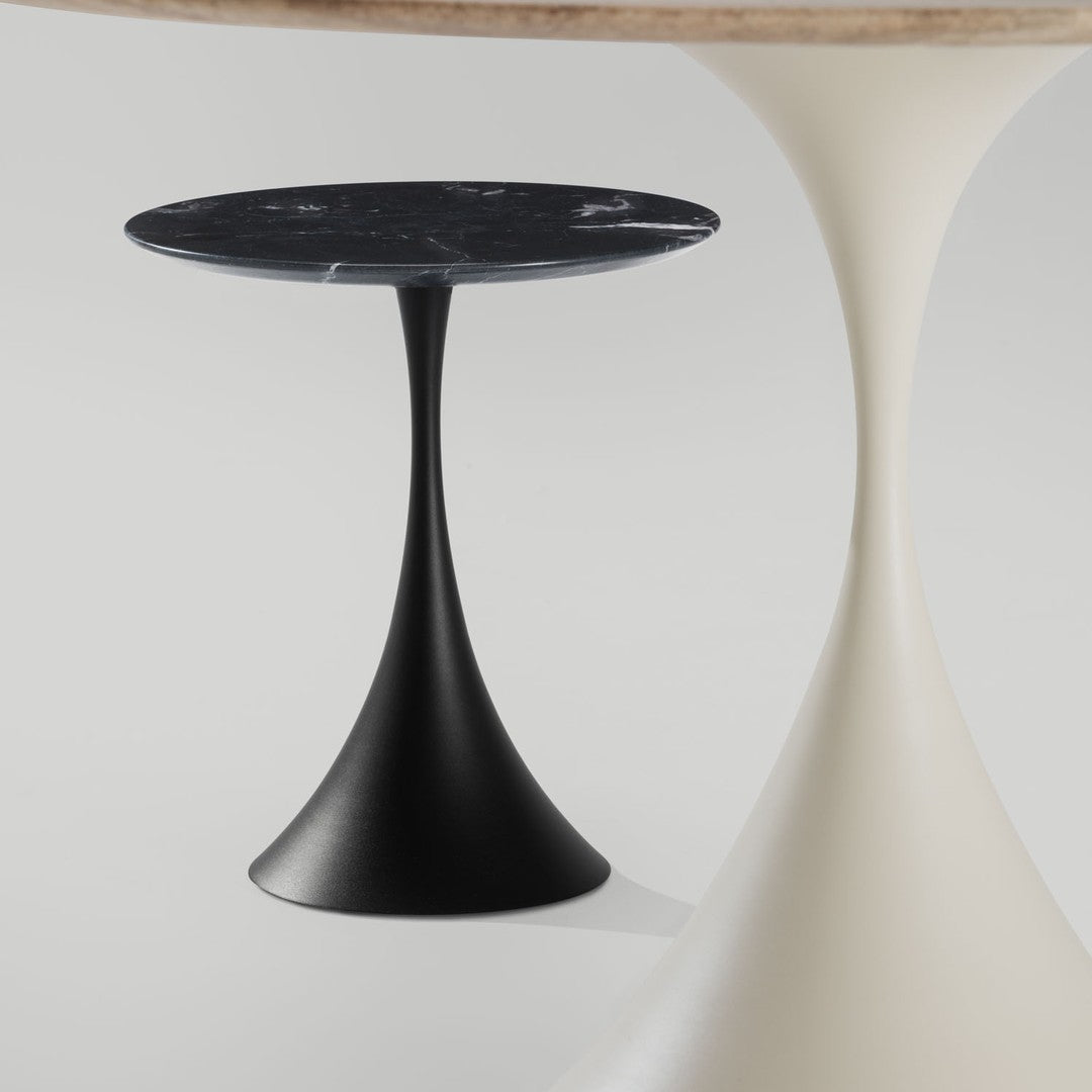 Stylish black and white table with a sleek, modern design and smooth marble pattern on the surface.