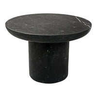 Black marble side table with a smooth, circular top and a cylindrical base, featuring subtle white veining.