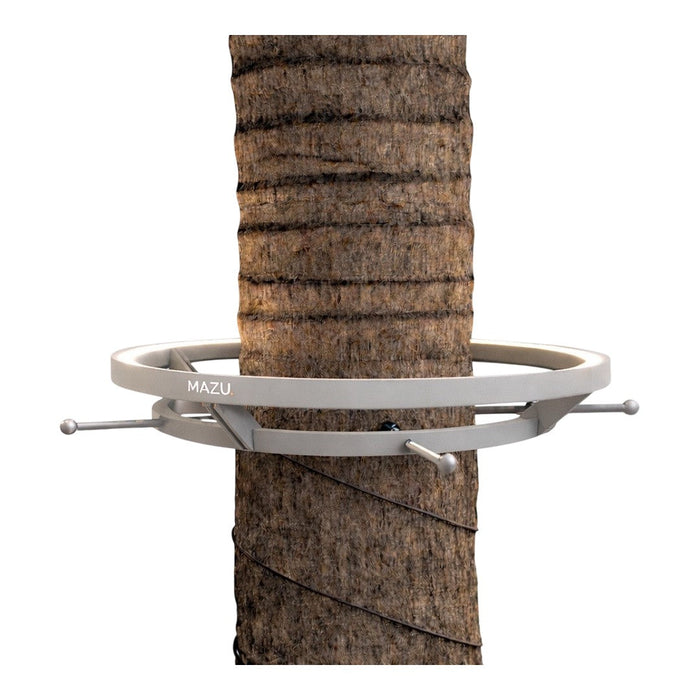 Gray circular tree mount with silver accents, showcasing a sleek and modern design against a textured tree bark background.