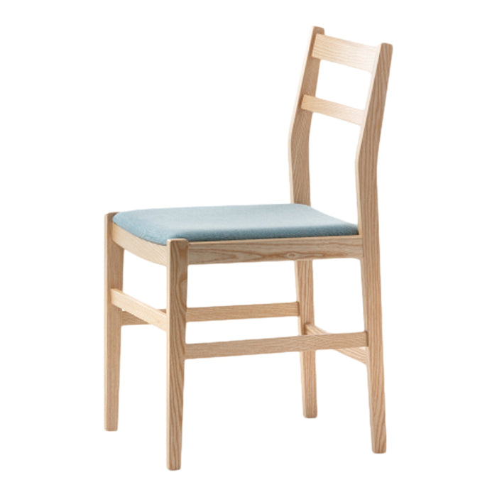 Light wood chair with a soft blue cushion, featuring a minimalist design and clean lines. Perfect for contemporary decor.