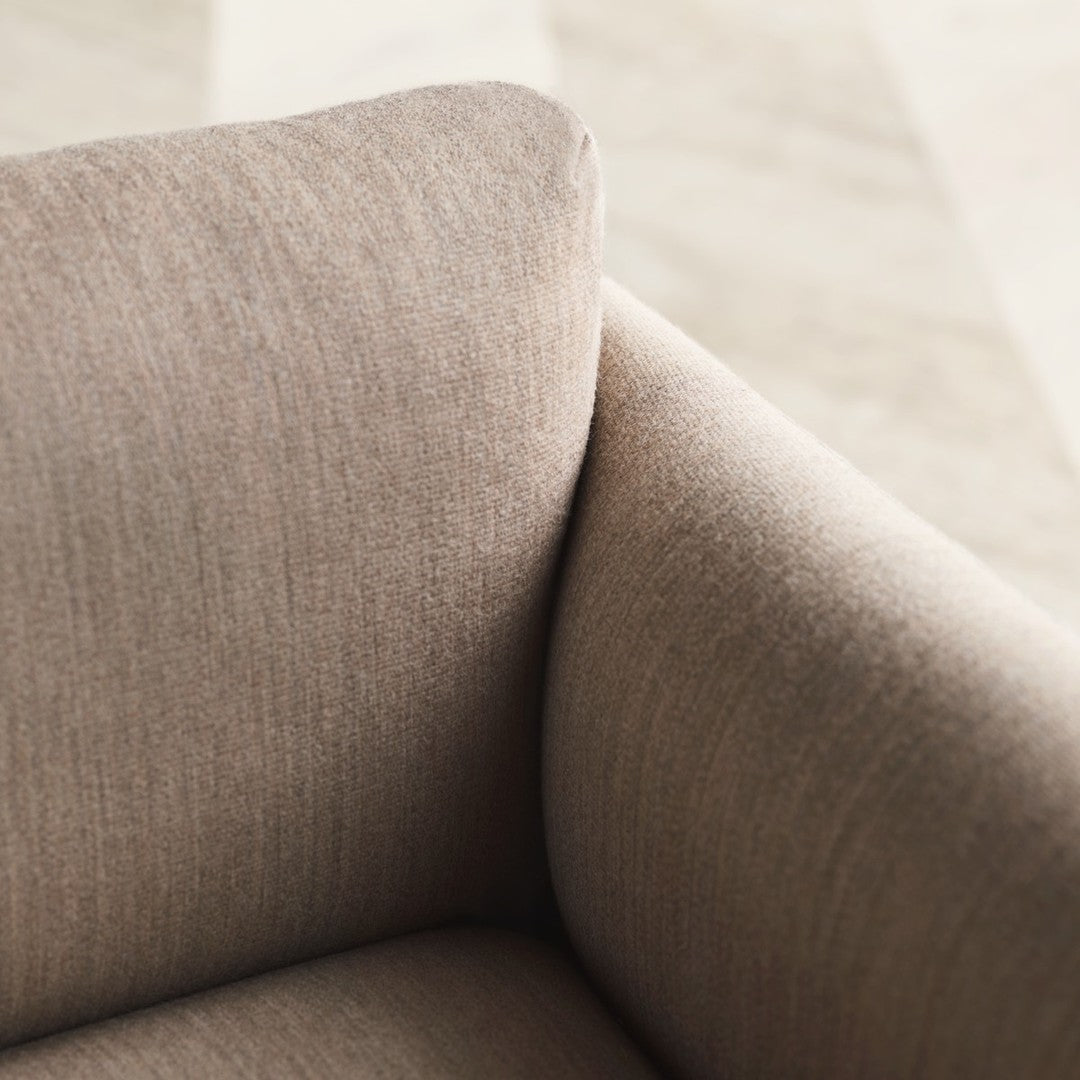 Textured light beige fabric with subtle, muted tones creating a sophisticated and modern aesthetic.