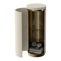 Cream-colored cylindrical cabinet with a sleek gold accent and glass shelves, featuring a modern design.