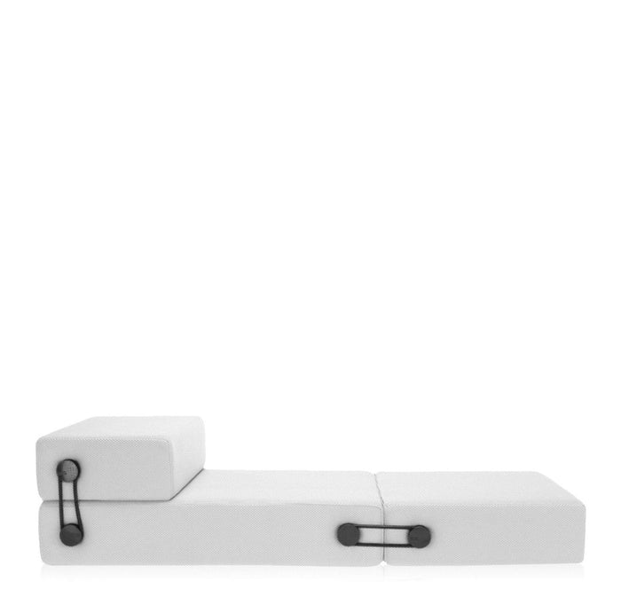 White modular sofa with sleek, minimalist design and subtle black accents. Perfect for modern decor.