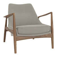 Light gray upholstered chair with a smooth texture and natural wood frame, showcasing a modern and minimalist design.