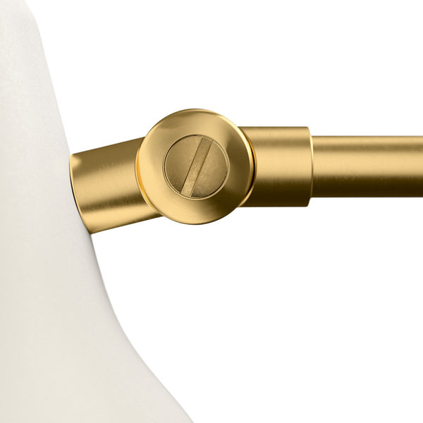 Gold lamp hardware with smooth, modern lines and a sleek white shade, showcasing elegant color contrast.
