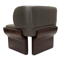 Brown woven fabric with a checkered pattern on a modern wooden base. Stylish and contemporary design.