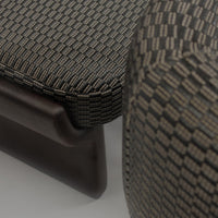 Textured black and gray patterned upholstery with a sophisticated woven design.