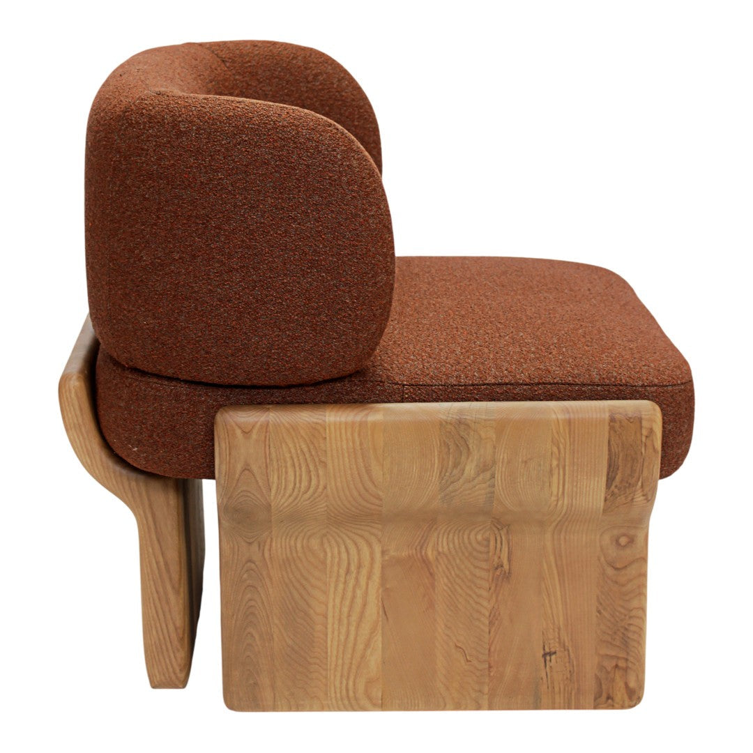 Rust-orange upholstered chair with smooth wood base, featuring a minimalist design and rounded contours.