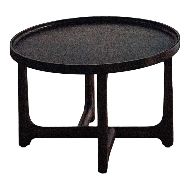 Black round coffee table with a smooth surface and simple, modern design. Dark wood legs enhance its contemporary style.