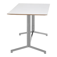White rectangular tabletop with a light wood edge and sleek silver metal legs. Modern and minimalist design.