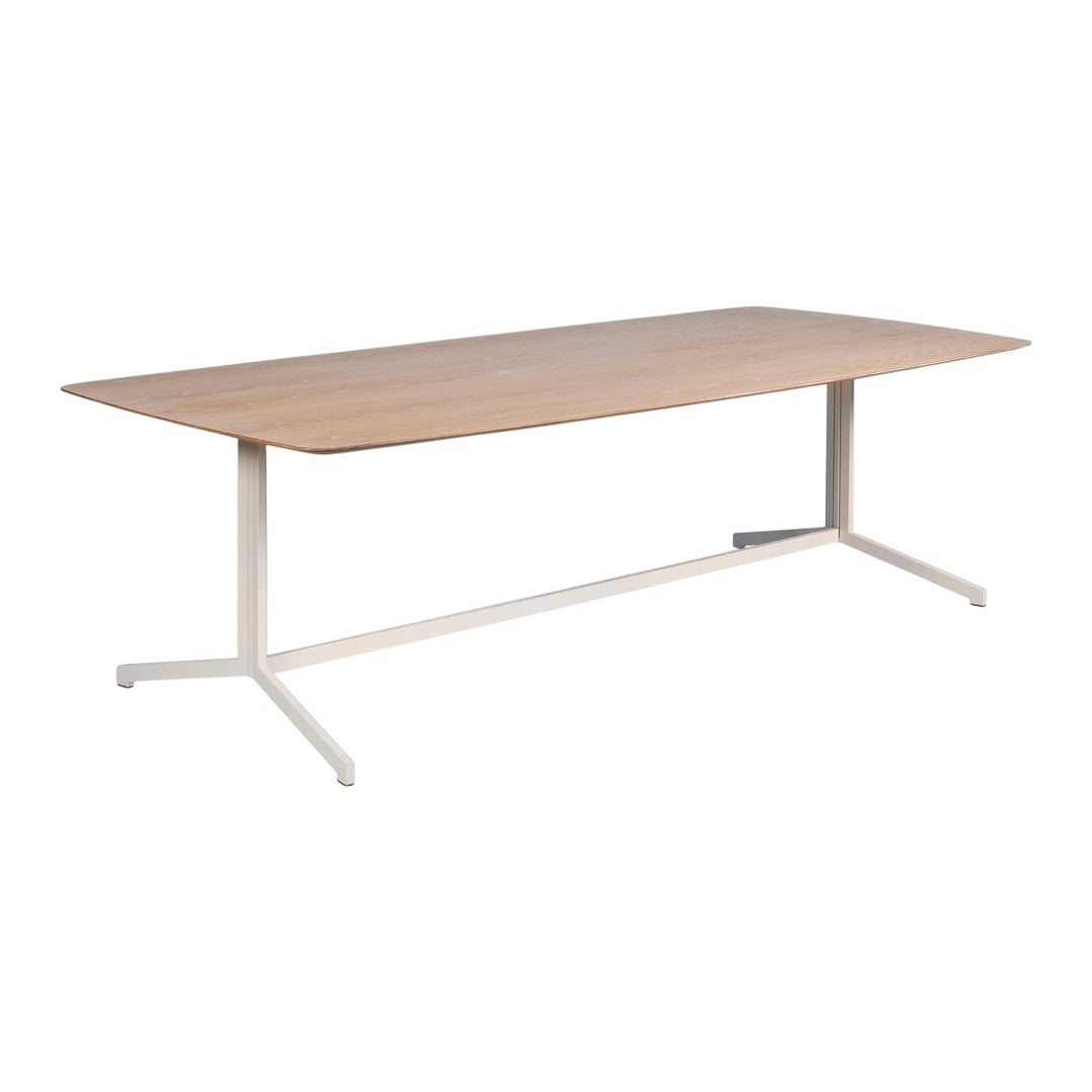 Light wood tabletop with a smooth grain pattern, supported by a sleek white metal frame. Minimalist design.
