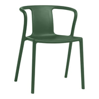 Green plastic chair with a simple design and smooth surface, perfect for modern decor.