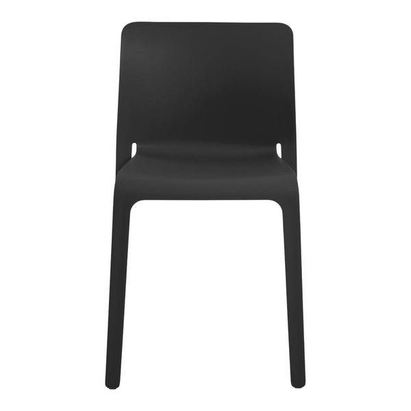 Black minimalist chair with a smooth, solid surface and modern design, perfect for contemporary interiors.