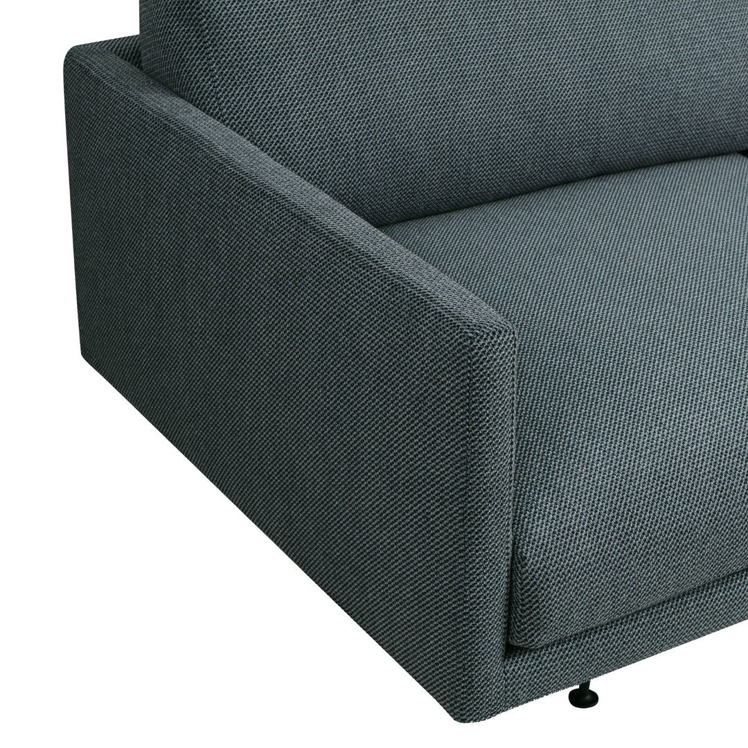 Gray textured fabric couch with a modern, neutral pattern and sleek armrests. Perfect for contemporary living spaces.