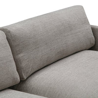 Light gray textured fabric couch with a smooth, minimalistic pattern and plush back cushions. Perfect for modern decor.