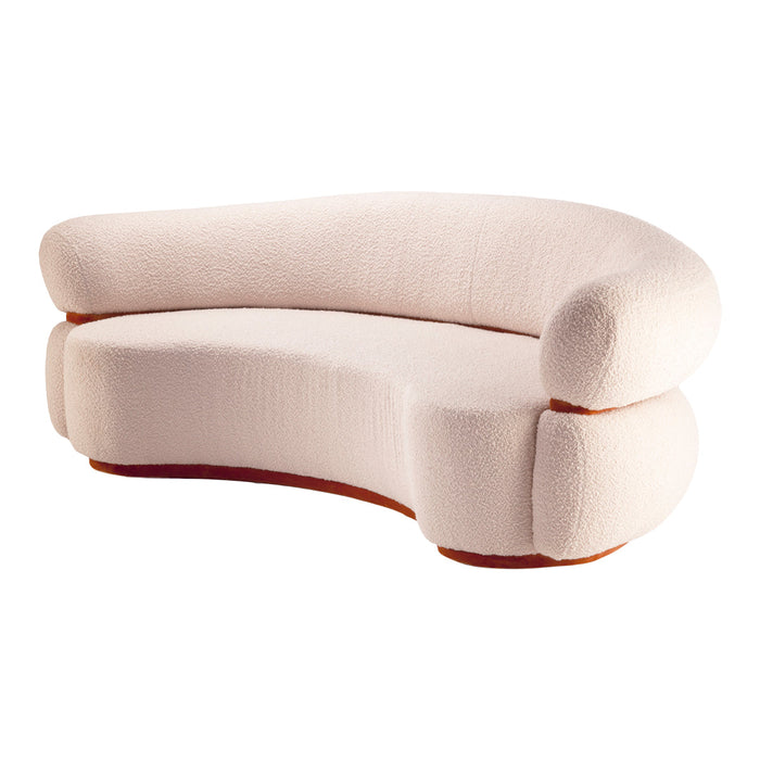Curved cream sofa with textured upholstery and subtle rounded shapes, ideal for modern living spaces.