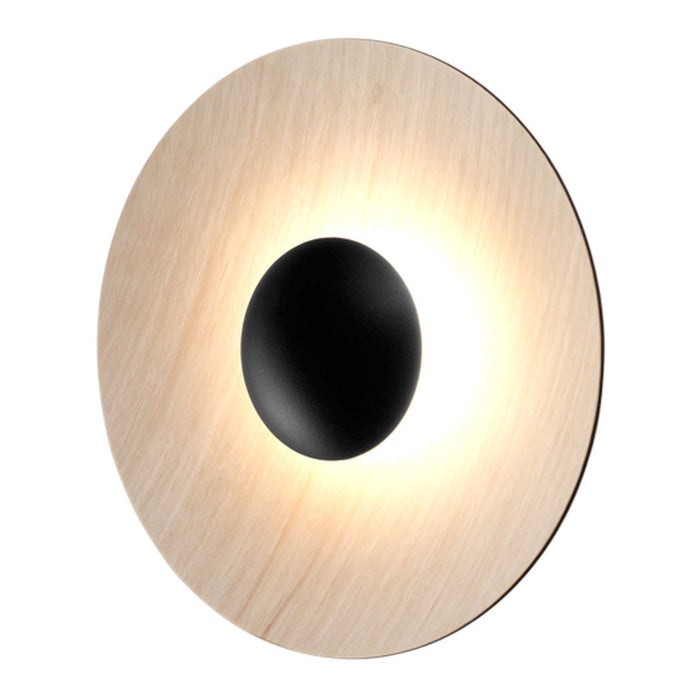 Black circular center with a light wood outer rim, featuring a smooth, minimalistic design. Perfect for modern spaces.