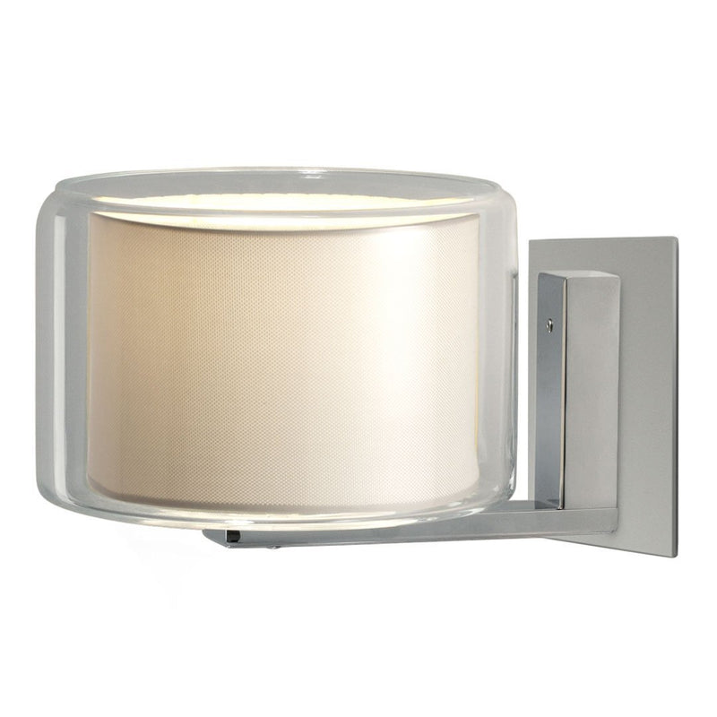 Modern wall lamp with a clear glass shade and beige fabric diffuser, featured on a sleek silver mount. 