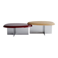 Set of two modern coffee tables featuring a red glossy top and a natural wood finish, both with sleek metal bases.