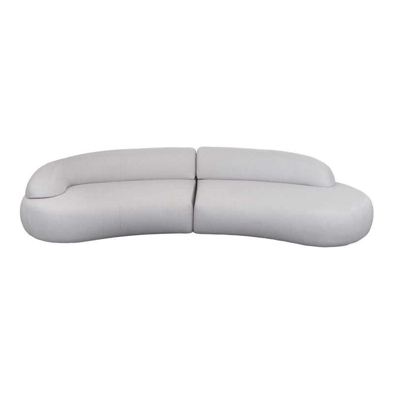 Curved light gray sofa with a smooth, minimalist design and subtle texture. Perfect for modern interiors.