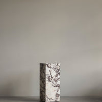 Elegant gray and white marbled vase with a modern geometric shape, ideal for contemporary decor.