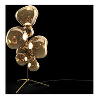 "Modern floor lamp with reflective gold bubbles on a sleek black base, creating an eye-catching design."