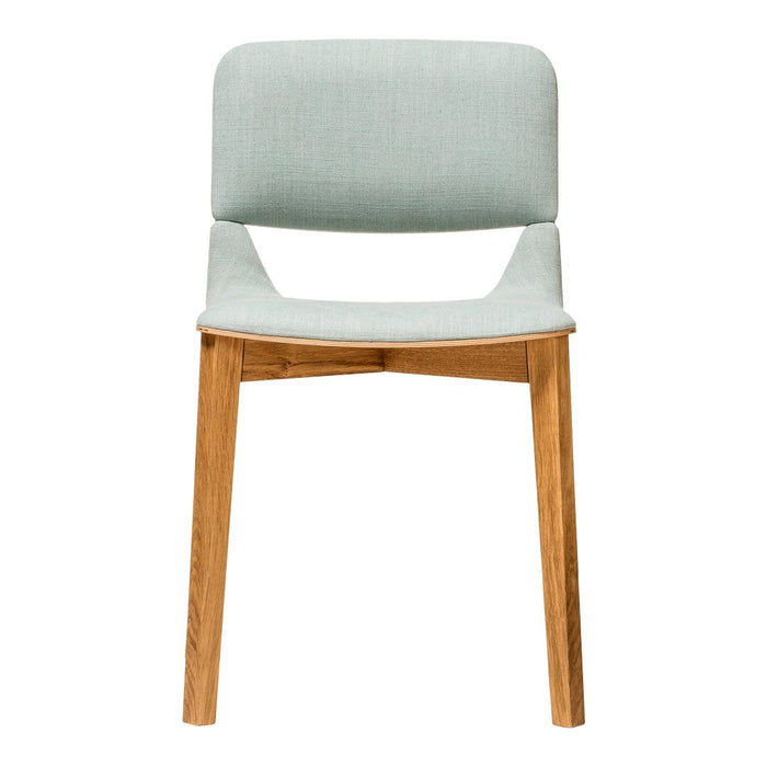 Light green fabric chair with a minimalist design and natural wooden legs, perfect for modern decor.