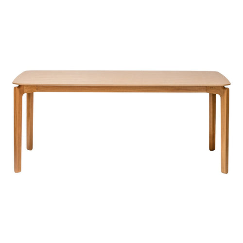 Light wood dining table with a smooth natural finish and minimalist design, featuring rounded edges and four sturdy legs.