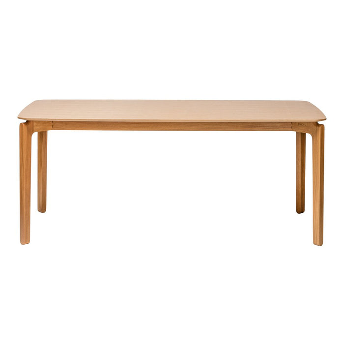 Light wood dining table with a smooth natural finish and minimalist design, featuring rounded edges and four sturdy legs.