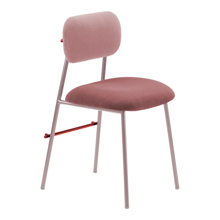 Soft pink velvet chair with a sleek gray metal frame and a striking red accent on the support bar.