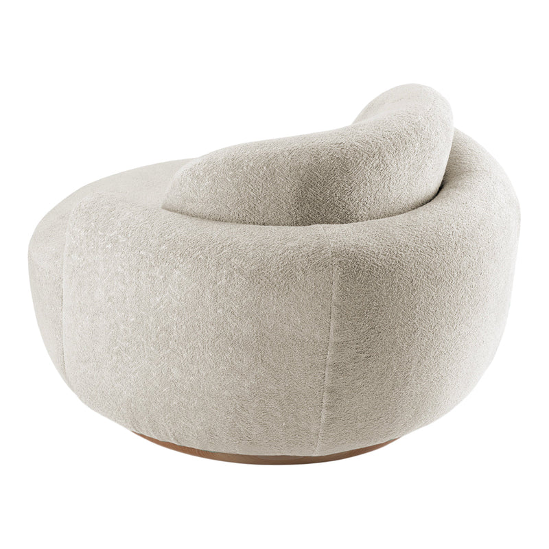 Beige textured accent chair with a soft, curved design and subtle light patterns. Perfect for modern interiors.
