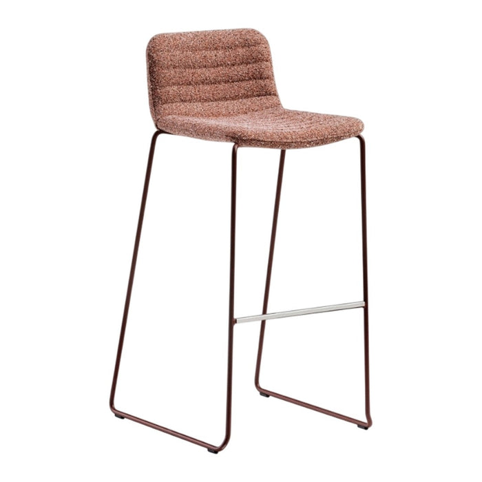 Textured, pinkish-brown bar stool with sleek metal legs and a modern design, perfect for contemporary spaces.