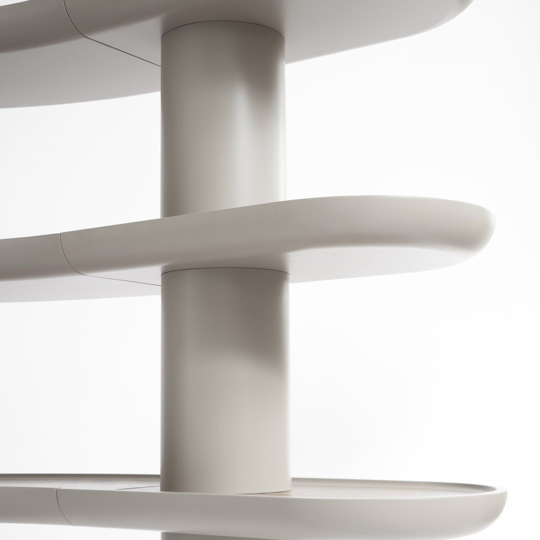 Light gray curved shelves against a white background, featuring smooth lines and minimalist design.