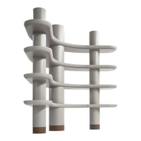 Modern multi-level shelf in a sleek white finish with smooth, curved lines and subtle wood accents at the base.