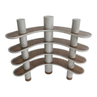 Curved wooden shelves with white cylindrical supports; features a light wood finish and smooth, contemporary design.