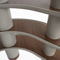 Curved white shelves with a warm wooden finish, featuring smooth lines and a modern design.