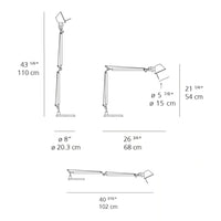 "Adjustable lamp with sleek silver finish and minimalist design, ideal for modern decor."