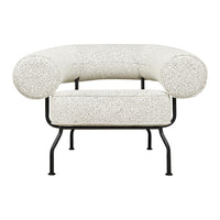 Curvy modern chair in off-white with a textured speckled pattern and black metal legs. Perfect for contemporary decor.