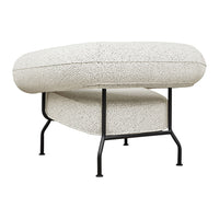 Textured white upholstery with black speckles, supported by a minimalist black metal frame.