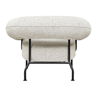 Cream textured ottoman with a speckled pattern and sleek black metal frame. Perfect for modern decor.