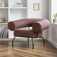 Curved maroon chair with textured fabric and black metal legs, perfect for modern living spaces.