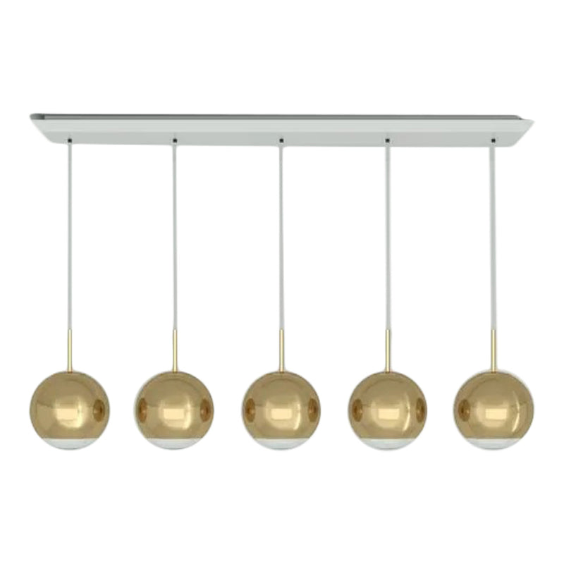 Modern pendant light with five gold spheres on a sleek silver base. Perfect for adding elegance to any space.