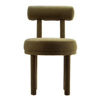 Green upholstered chair with a minimalist design and soft textured fabric. Modern and stylish accent piece for any room.